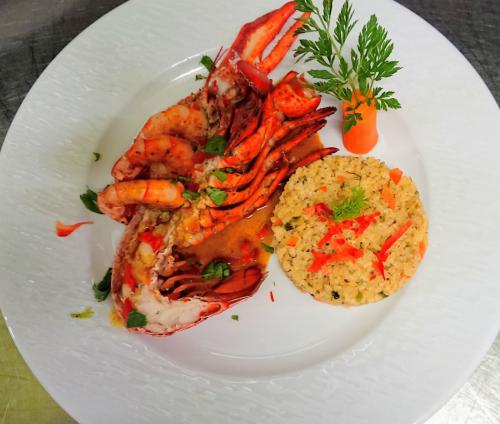 Homard sauce fruits de mer