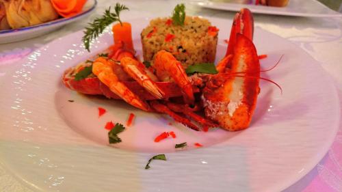 Homard sauce fruits de mer 